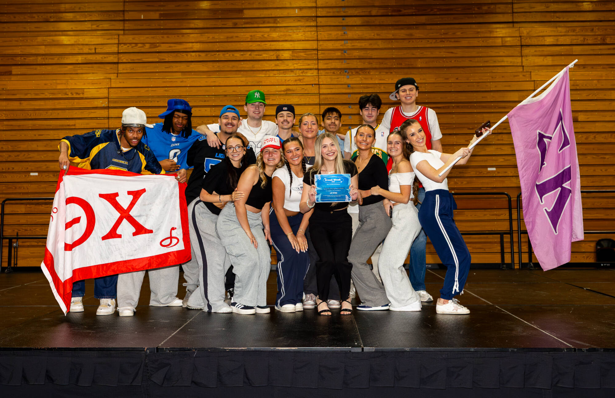 Fraternity and Sorority members posing for a photo